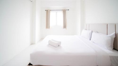 Surabaya Apartment | Best Choice 2BR at Puncak Dharmahusada Apartment Surabaya By Travelio