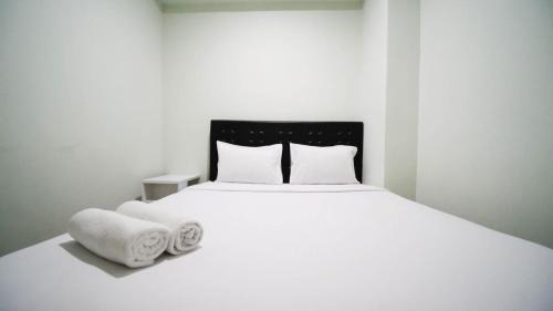 Surabaya Apartment | Best Choice and Cozy Living at 2BR at Bale Hinggil Apartment By Travelio