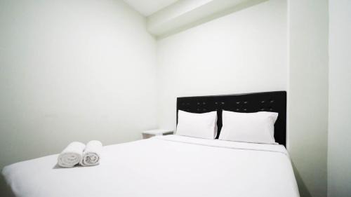 Surabaya Apartment | Best Choice and Cozy Living at 2BR at Bale Hinggil Apartment By Travelio