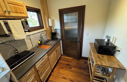 Sandpoint House | Best location! King bed master suite with private rooftop patio and steam room.