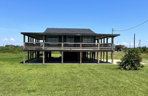 Galveston House | Best sunset views in Bolivar! Come relax on the wraparound deck.