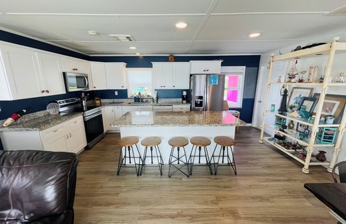 Cedar Lane House | Best Texas Fishing, Waterfront with a Swimming Pool and Pet Friendly