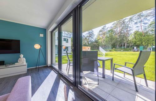 Krakow am See Apartment | Bewusstsein - Modernes Apartment mit Terrasse, Walk-In-Dusche & Wellnesszugang