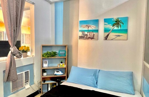Pinagsama Hotel | BGC Mckinley City Center Apartments