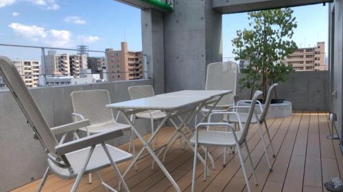 Hiroshima City Centre Apartment | bHOTEL Nekoyard - Scenic Penthouse Studio with Jacuzzi & Spacious Terrace