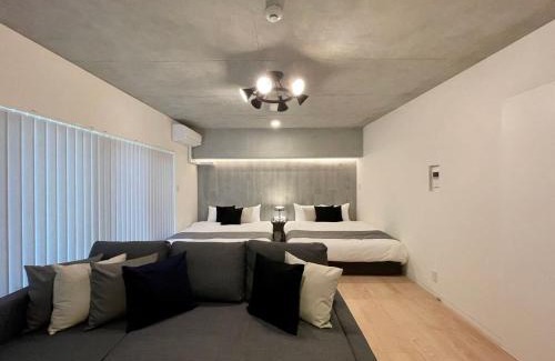 Hiroshima City Centre Apartment | bHOTEL Nekoyard - Scenic Penthouse Studio with Jacuzzi & Spacious Terrace
