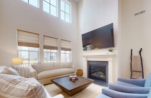 Millville Villa | Bishop's Landing new villa with EVC, fireplace, outdoor pool, gym, and tennis