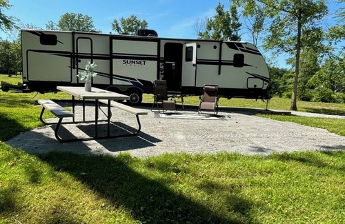 Lucas RV Rental | Black Fork River front fully functioning Camper