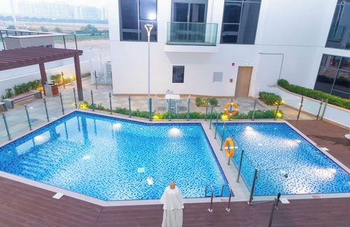 Nad Al Sheba Apartment | Bloomfields Modern 2BR Azizi Gardens