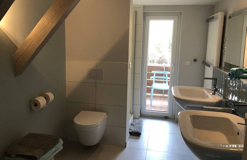 Mainstockheim House | Blue Room with balcony: remodeled historical room of a school teacher with bath