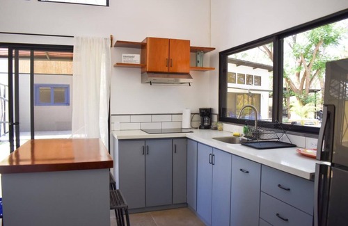 Junquillal Apartment | Blue Window