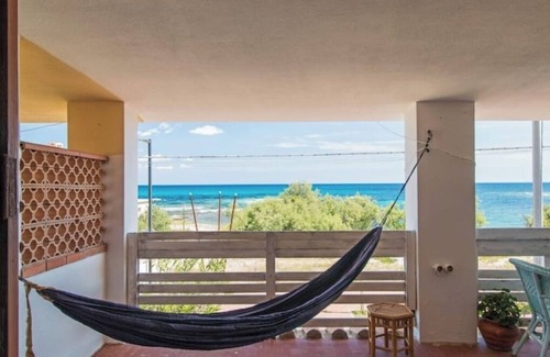La Caletta House | Boat beach house