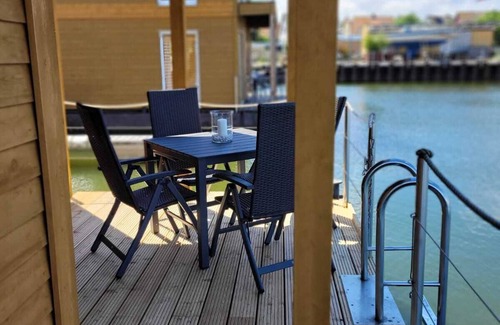 Ostvorpommern Boat Rental | Boat 'Floating House' with Lake View, Private Terrace and Wi-Fi