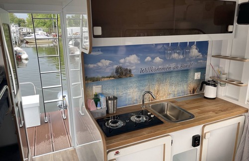 Wildau Boat Rental | Boat 'Hausboot Edda' with Private Terrace and Wi-Fi