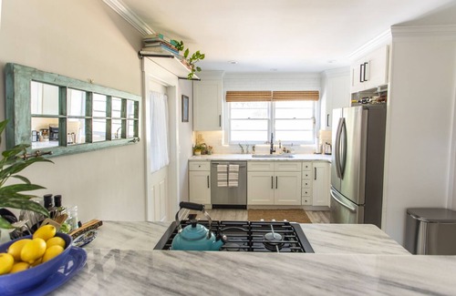 Riverland Terrace House | Bohemian Cottage with Outdoor Oasis w/Golf Cart!