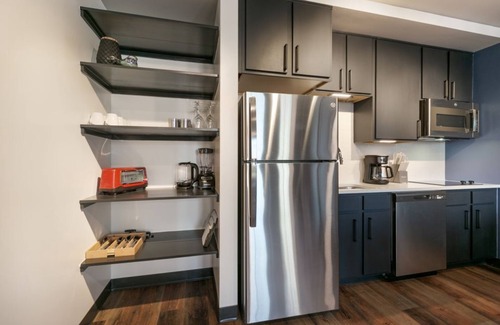 Central Business District Hotel | Bohemian Elegance: 2BR Gem Condo with Balcony