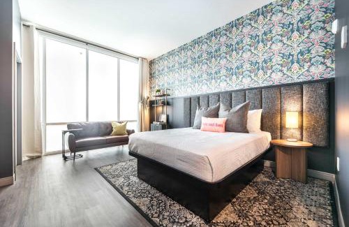 Macon Apartment | Bold and Bright Stay with Cher & Etta James Flair