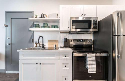 Macon Apartment | Bold and Bright Stay with Cher & Etta James Flair