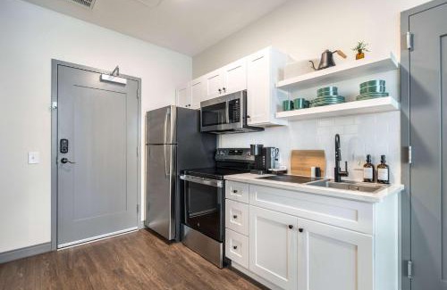 Macon Apartment | Bold and Bright Stay with Cher & Etta James Flair