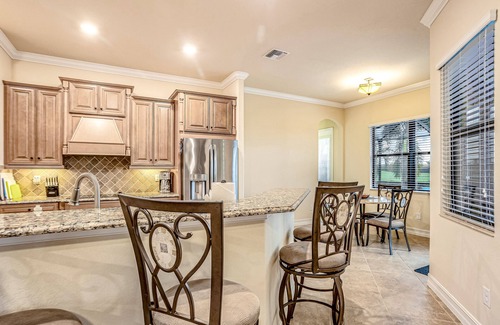 Bonita Springs House | Bonita National dog-friendly home with a lanai, pool, pool spa, and home office