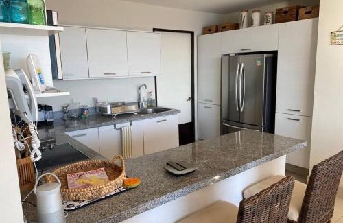 Olas Altas Apartment | Bonito departamento pie de playa en el mejor condominio de manzanillo, Ponto Horizonte. Hermosa vista, hasta para 8 personas. Ambiente familiar.