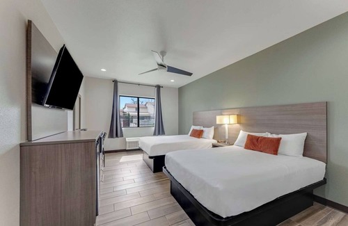 Eastside Promise Neighborhood Hotel | Book Your Stay: 3 Cozy Rooms w/Complimentary Breakfast & Parking in DT