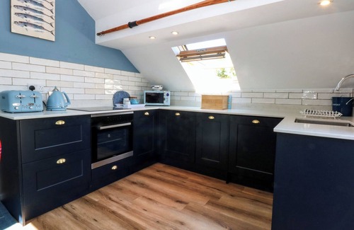 Rhoscolyn House | BORTH ARIAN BOAT HOUSE, family friendly, with open fire in Rhoscolyn