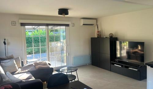 Oisterwijk Ski Chalet | Boscottage met ruime tuin en airco!