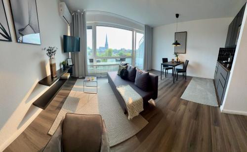 Moers Apartment | BOSTEL 89 - Apartment, in der Altstadt, Klimaanlage, Aufzug