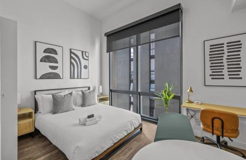 Evans Churchill Apartment | Boulevard Stays Modern Highrise STU Sky Pool Parking Gym 07
