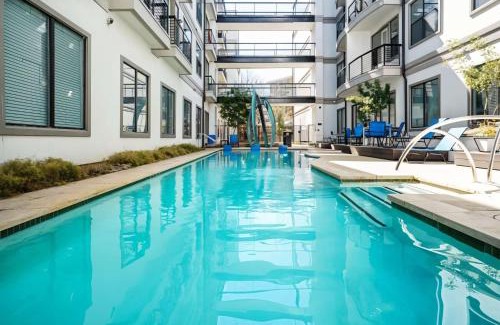 Travis Heights Apartment | Boulevard Stays Prime SoCo 2BR Walk Downtown Pool Gym Parking
