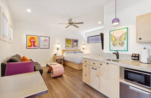 Folly Beach Hotel | Boutique Hotel Folly Room 3: King Studio - cozy porch views of the Folly River