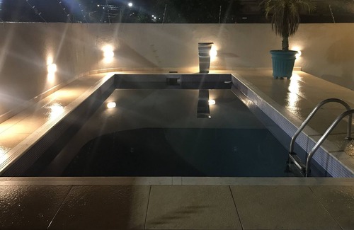 Guaruja House | Beautiful townhouse with barbecue and pool