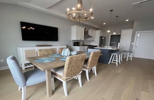 North Beach Haven Condo | Brand new Bayfront Luxury Townhome with Pool and Elevator.