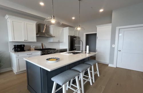 North Beach Haven Condo | Brand new Bayfront Luxury Townhome with Pool and Elevator.
