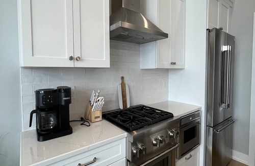 North Beach Haven Condo | Brand new Bayfront Luxury Townhome with Pool and Elevator.