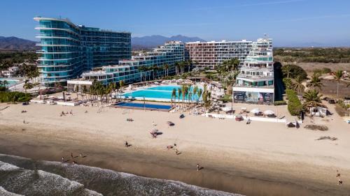 Flamingos Apartment | Brand New Condo Aria Ocean 501 by Kivoya