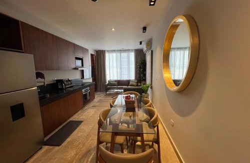 Jimenez Apartment | Brand New on 5th Av The vibrant hearth of the city
