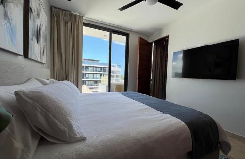Jimenez Apartment | Brand New on 5th Av The vibrant hearth of the city