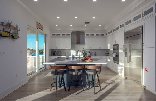 Marathon Villa | Brand New Single Family 5/5 -90ft dock, pool, paddle boards, bicycles plus more!