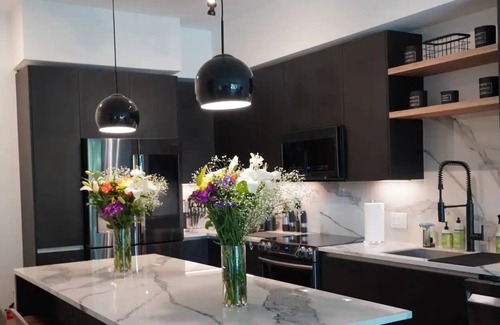 Edgewater Condo | Brand New Upscale Luxury Designer Home Water Views