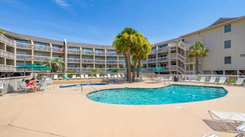 North Forest Beach Villa | Breakers Condo with Ocean & Pool Views, Walk to Beach, Shops