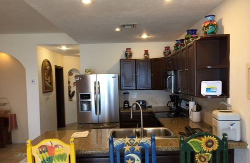Brisas del Golfo Condo | Breathtaking Sunsets Just Steps From The Sand & Sea On Beautiful Sandy Beach