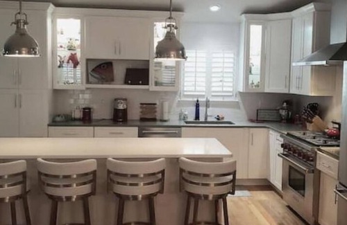 Villas House | Breezy Corner Getaway 4 Bedroom home with spectacular sunset views.
