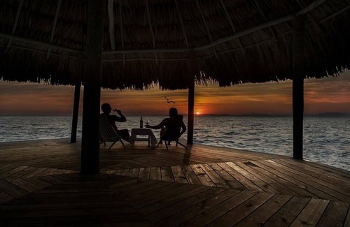 Thatch Caye Resort | Breezy Oceanfront Cabana w/Walk-In Shower & Private Rooftop Deck