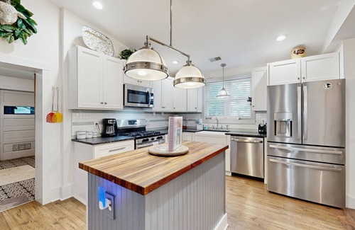 Hanahan House | Breezy, renovated home with fenced yard, front porch & lovely living spaces