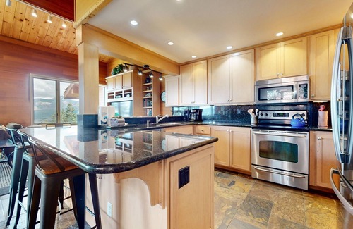 Mammoth Lakes Condo | Bridges Townhome 13 Mountain View Townhome just Steps to the Slopes with Private Garage and Washer Dryer by RedAwning