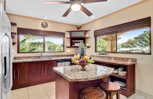 Junquillal Condo | Bright 2BR, 2BA condo with A/C, pool, fast Wi-Fi, and garden-view balcony. Walk to Playa Junquillal.