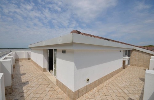 Bibione Pineda Apartment | Bright and modern holiday home in a poolside residence