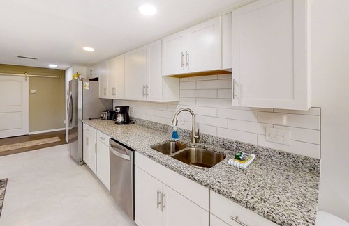 Southside House | Bright and modern home with a large yard, grill, air hockey table, & fireplace